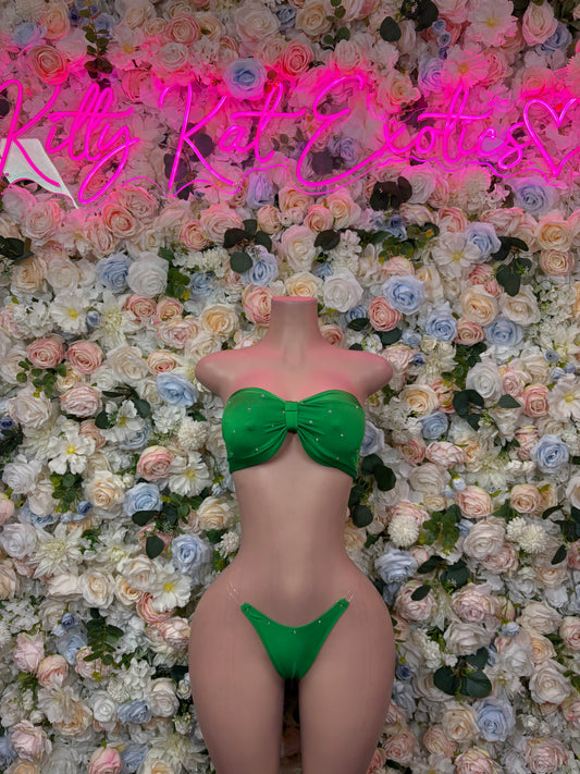 Green two-piece bikini with knotted strapless top and matching high-cut bottoms