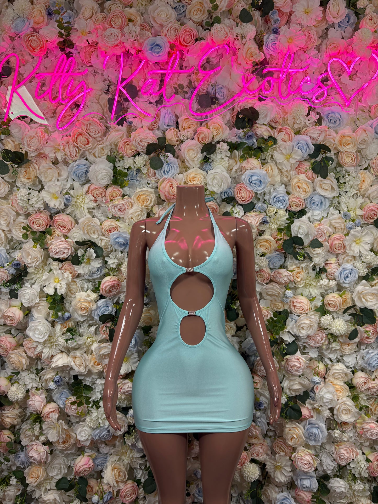 Teal halter dance dress with keyhole cutout at bust and oval cutout at waist