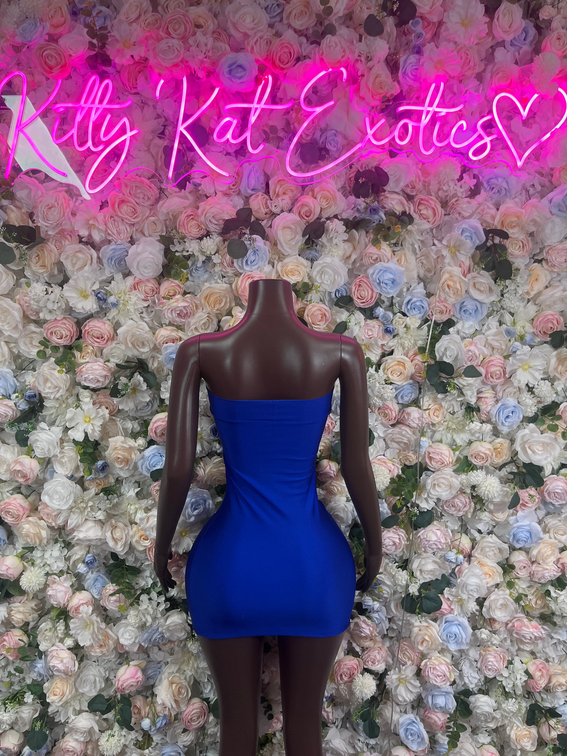 Royal blue strapless one-piece club dress with sweetheart neckline and fitted mini length
