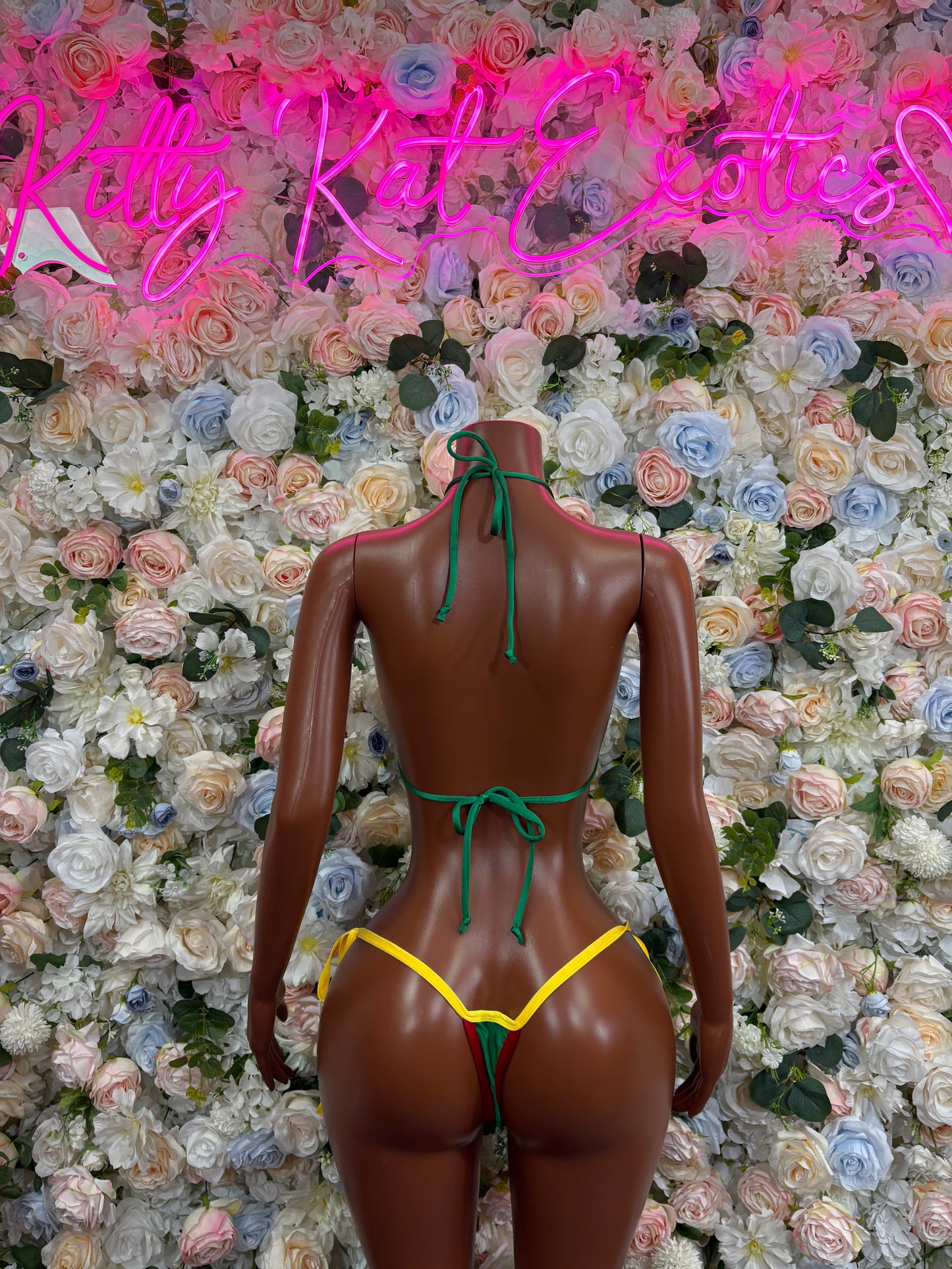 Red, yellow, and green bikini with strappy back and tie-side bottoms