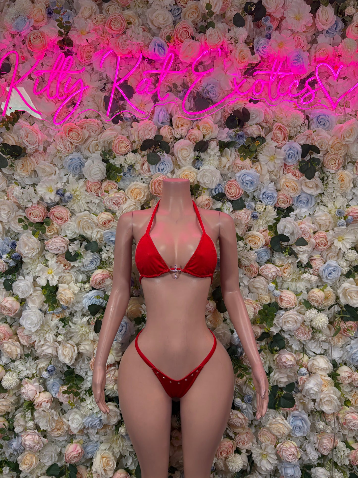 Red bikini two-piece set with triangle top and tie-side bottoms