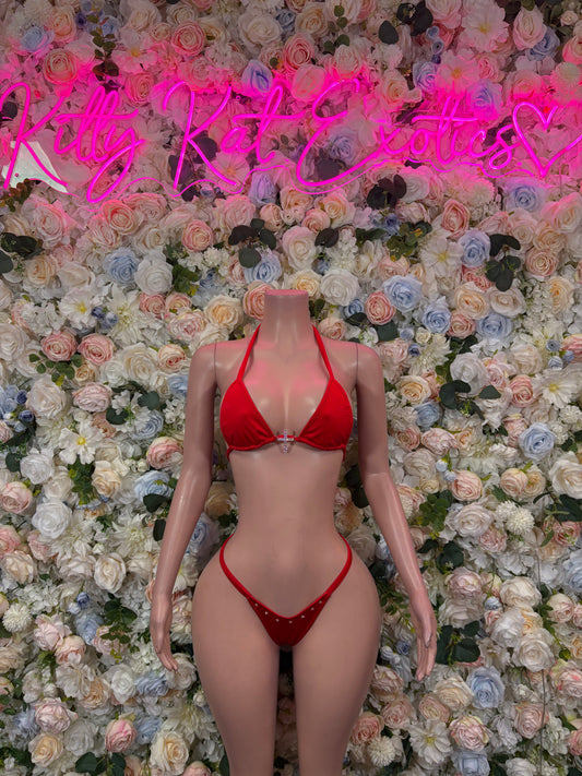 Red bikini two-piece set with triangle top and tie-side bottoms