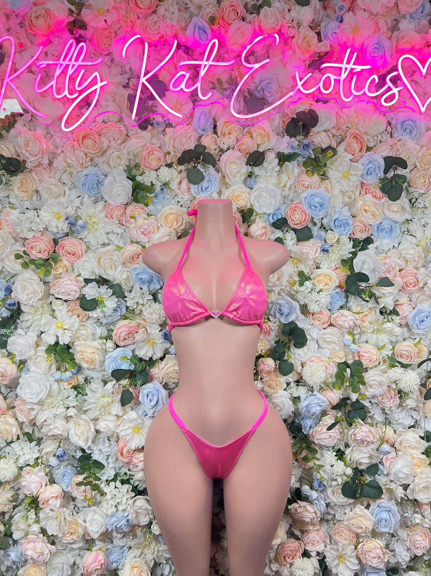 Pink metallic string bikini set with triangle top and high-cut tie bottoms
