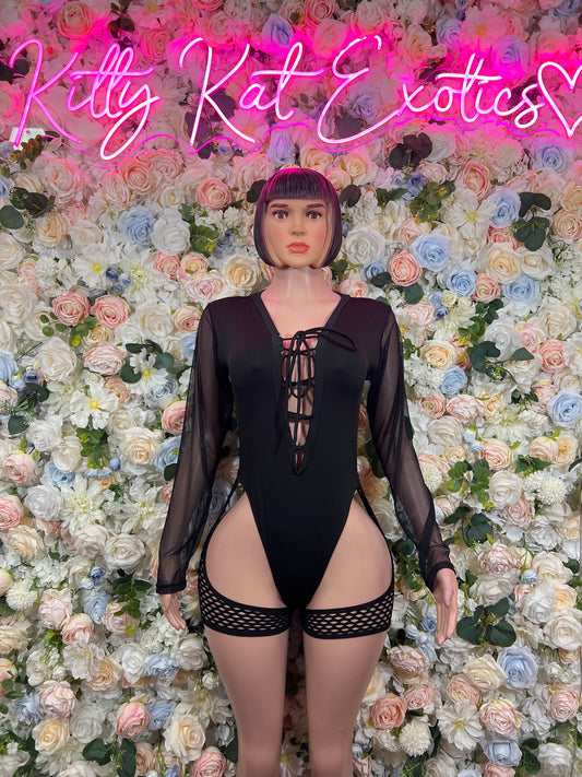 Black long-sleeve lace-up bodysuit with sheer sleeves and fishnet garter shorts