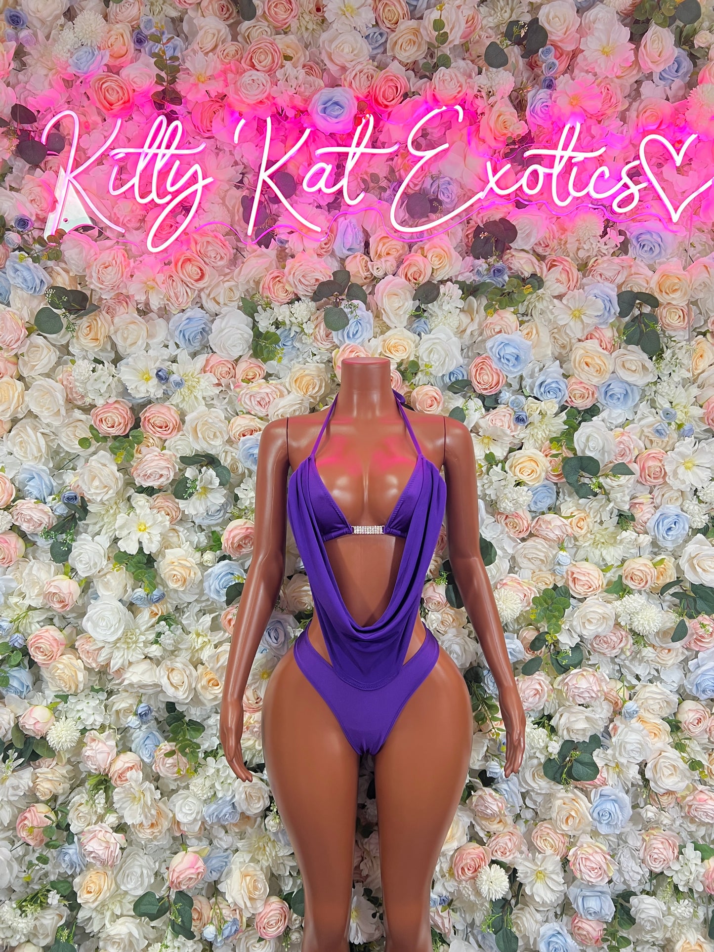 Purple halter draped one-piece with open back and tie straps