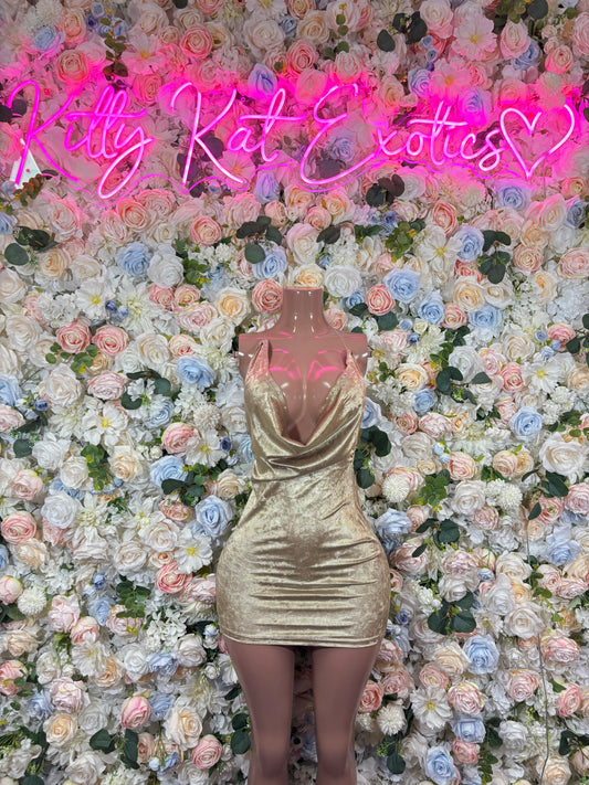 Gold ruched mini dress with draped neckline and gathered bust