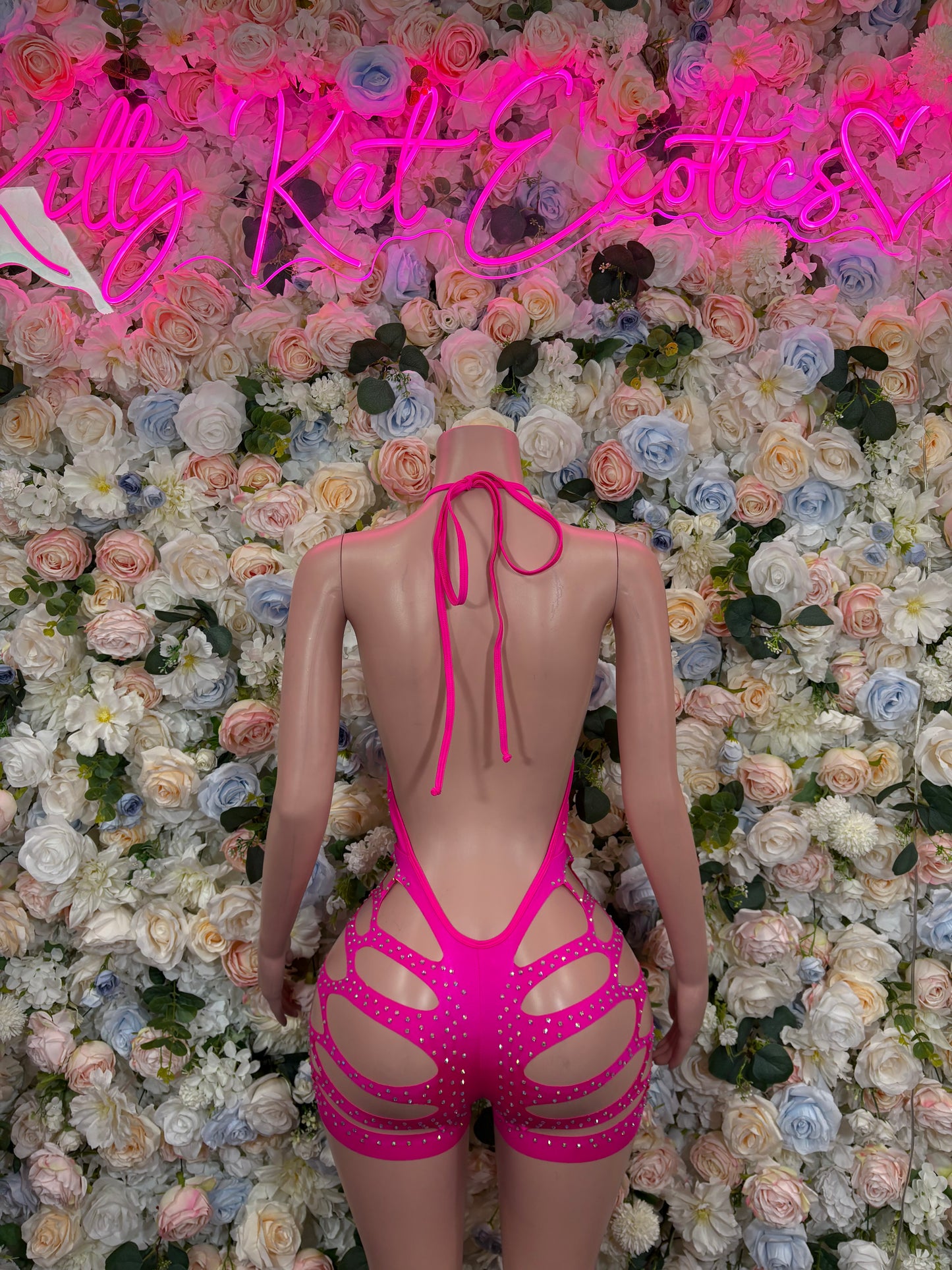Pink rhinestone bodysuit, strappy open back with bow ties and cutout sides
