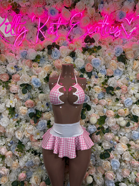 Pink plaid bra top and matching mini skirt with bow straps and scalloped trim