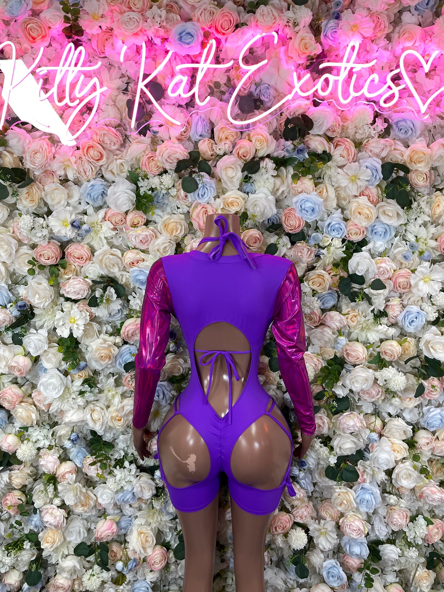 Purple long-sleeve halter bodysuit with tie front, lace-up back cutout