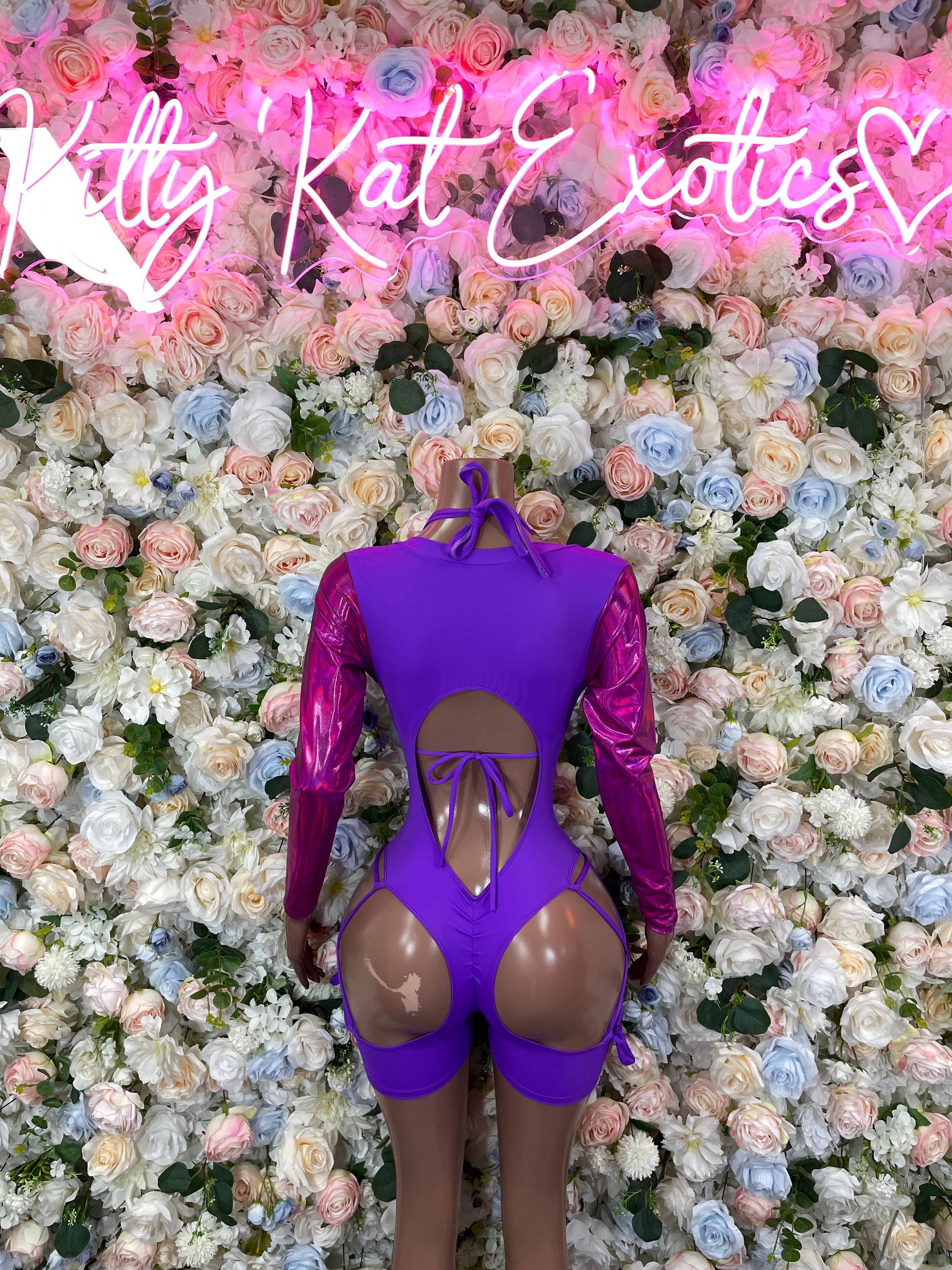 Purple long-sleeve halter bodysuit with tie front, lace-up back cutout