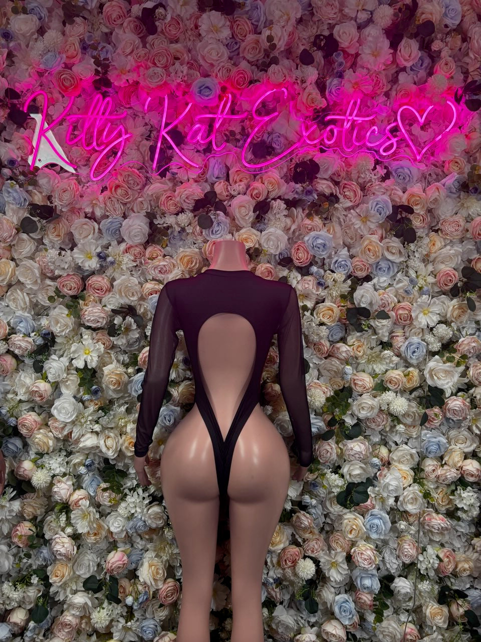 Rose print sheer lace bodysuit with open back and red thong-style panel