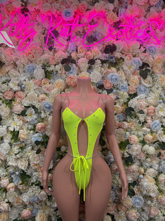 Neon green one-piece bodysuit with deep V neckline and tie-back strap details