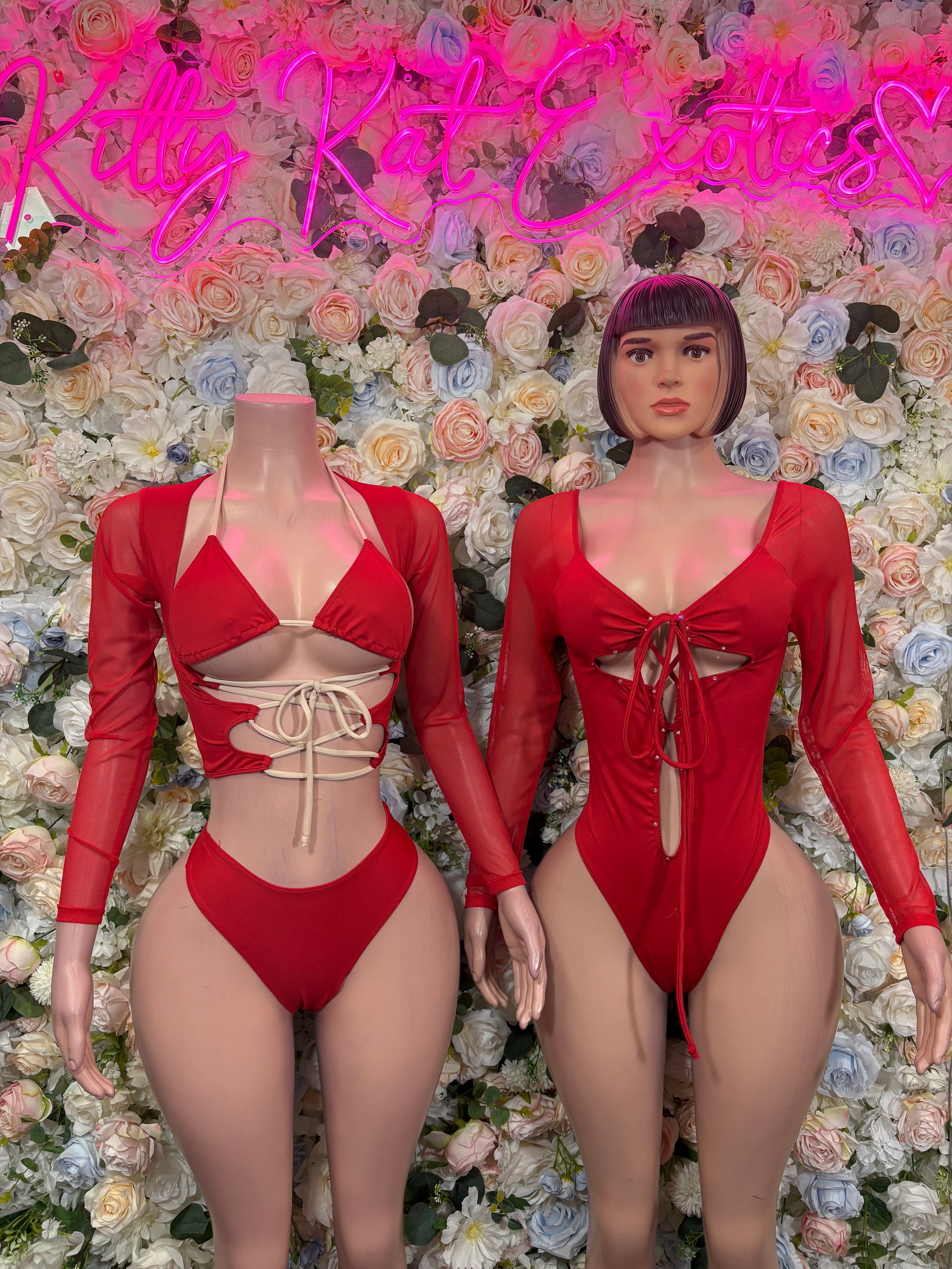 Red long-sleeve bodysuit with sweetheart neckline and front tie bow detail