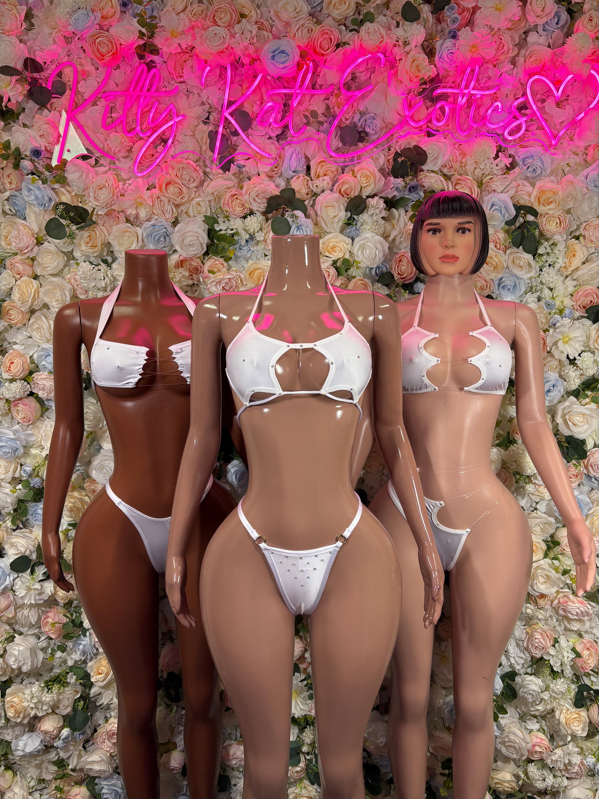 White bikini two-piece set with triangle halter top and string bikini bottoms