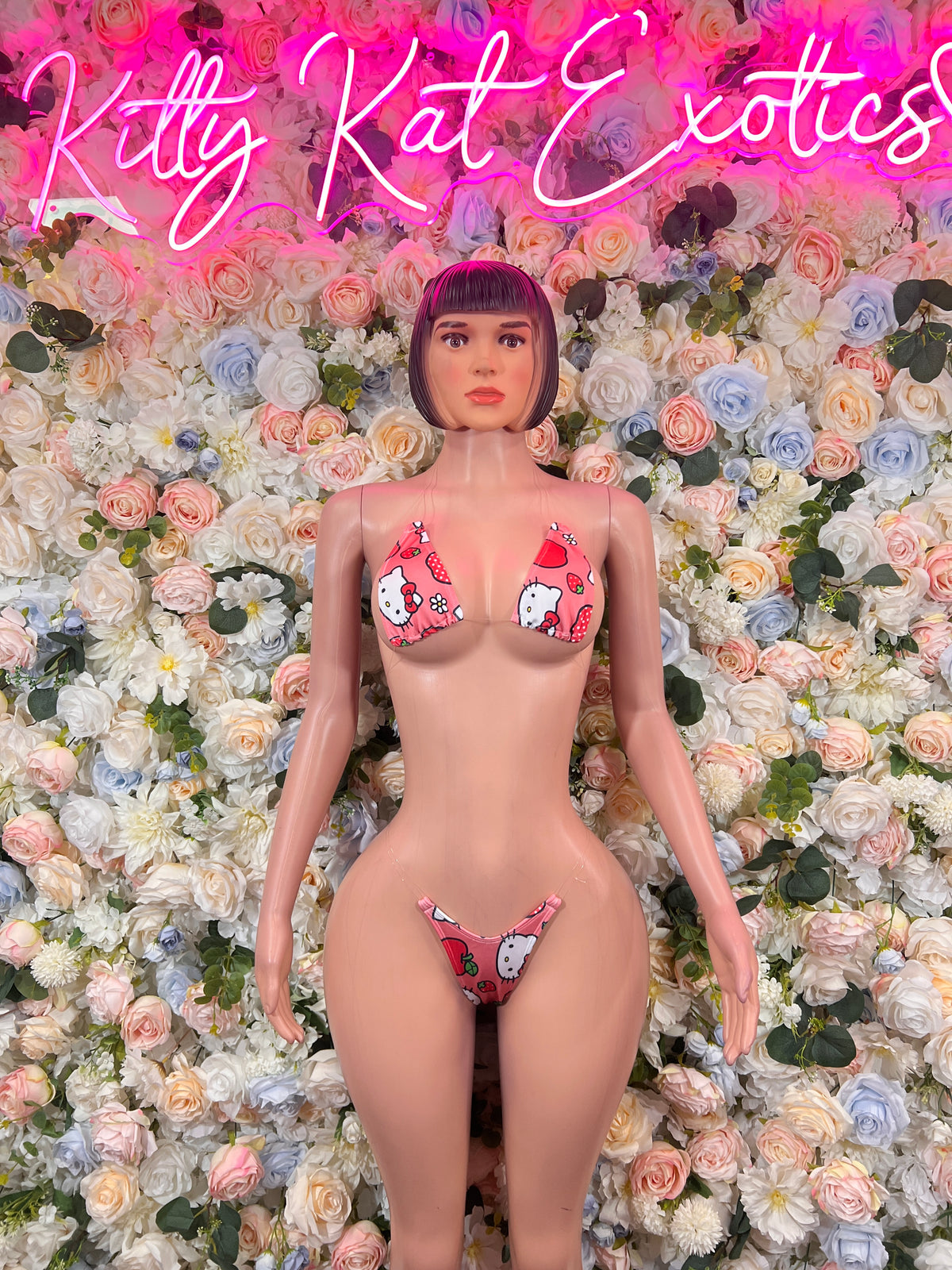 Pink print bikini set with triangle bra and g-string bottom, front view