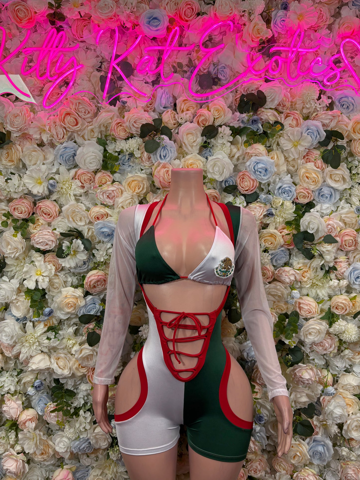 Women’s bodysuit: green, white, red lattice front with long sheer sleeves