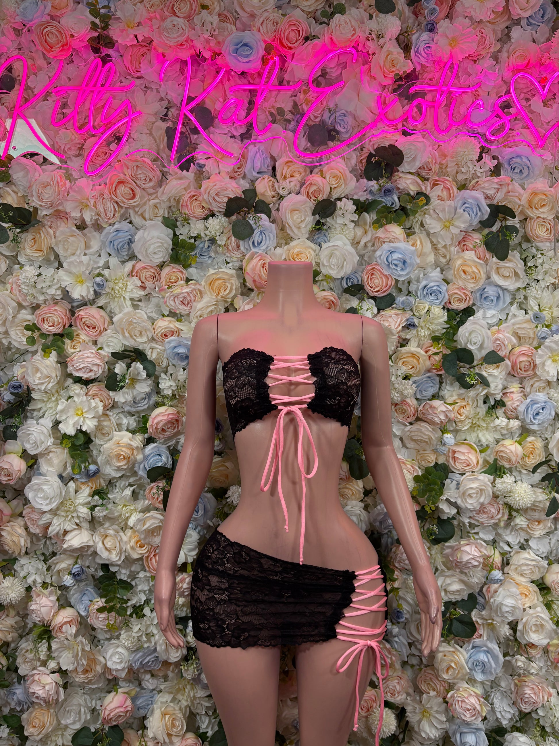 Black lace mini skirt set with pink ribbon ties
