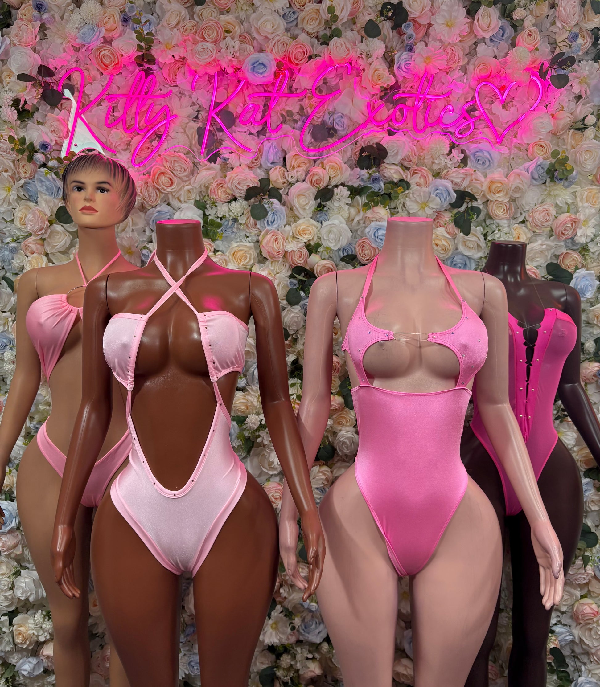 Rave bodysuit set on models: white halter one-piece and hot pink one-piece
