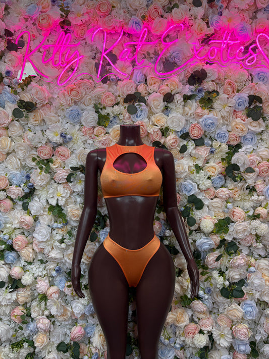 Two-piece orange cutout swimsuit with halter top and high-cut bottoms, front view