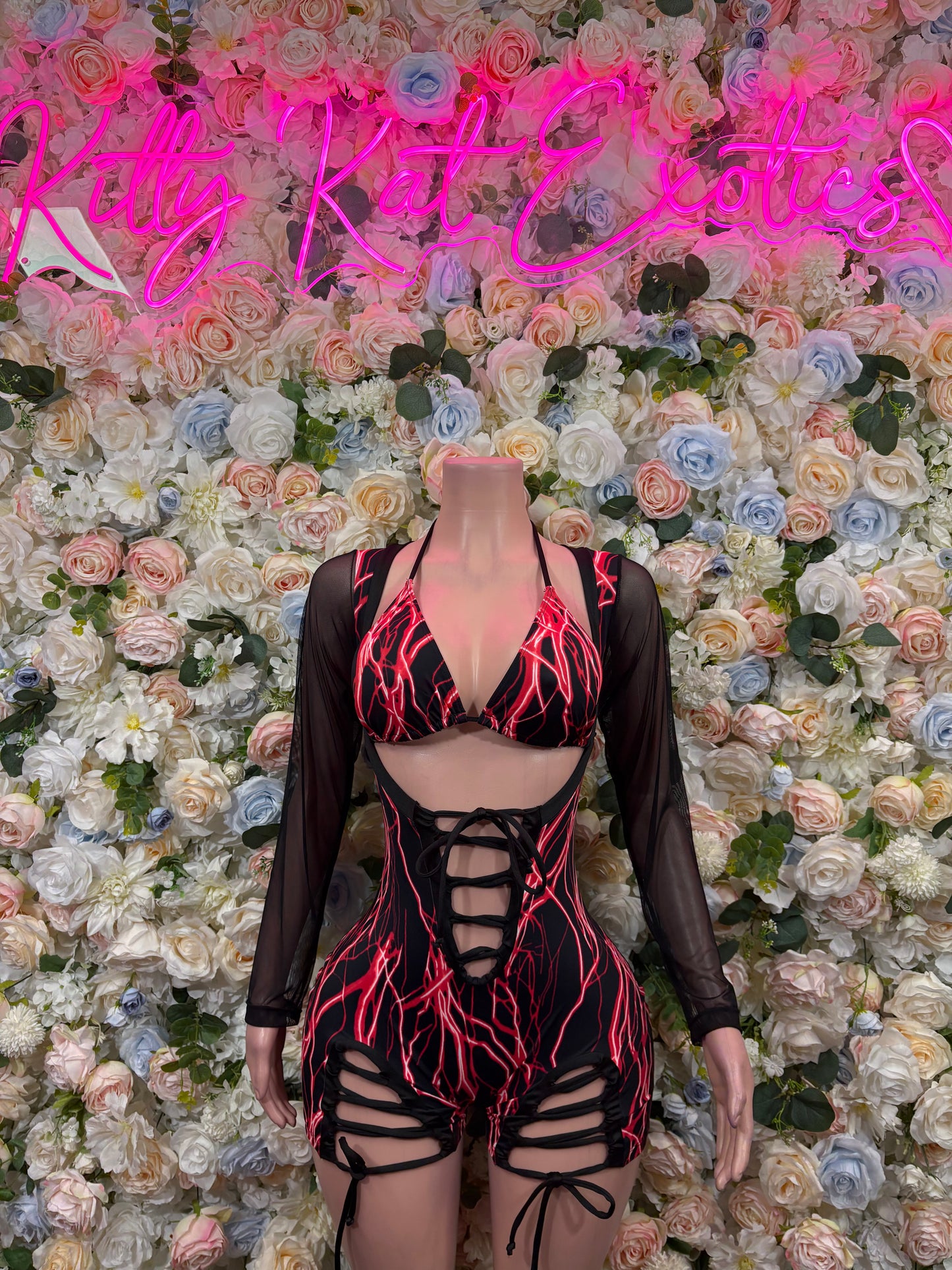 Black one-piece dance bodysuit with red neon lines, cutout lace-up front and long sleeves