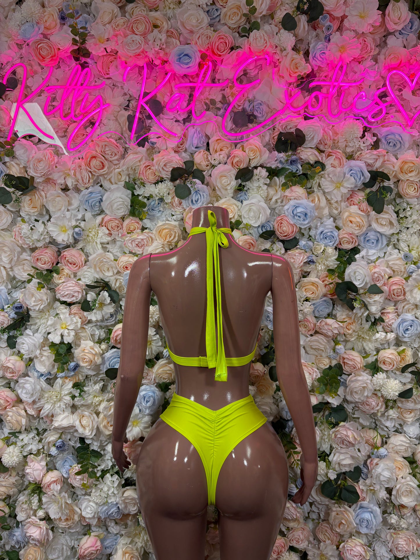 Neon lime green rave two-piece set, halter top with back tie and high-cut bottoms