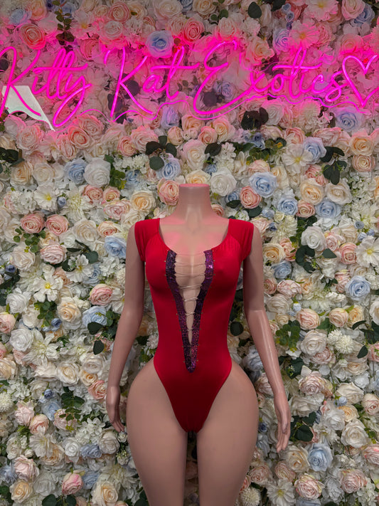 Red sleeveless bodysuit with lace trim and deep V front and back cutout