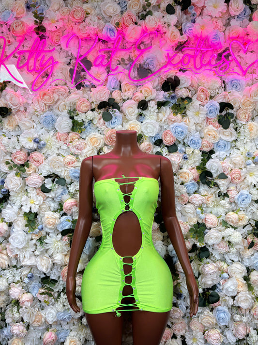 Neon green mini dress with halter straps and front cutout, ruched seams