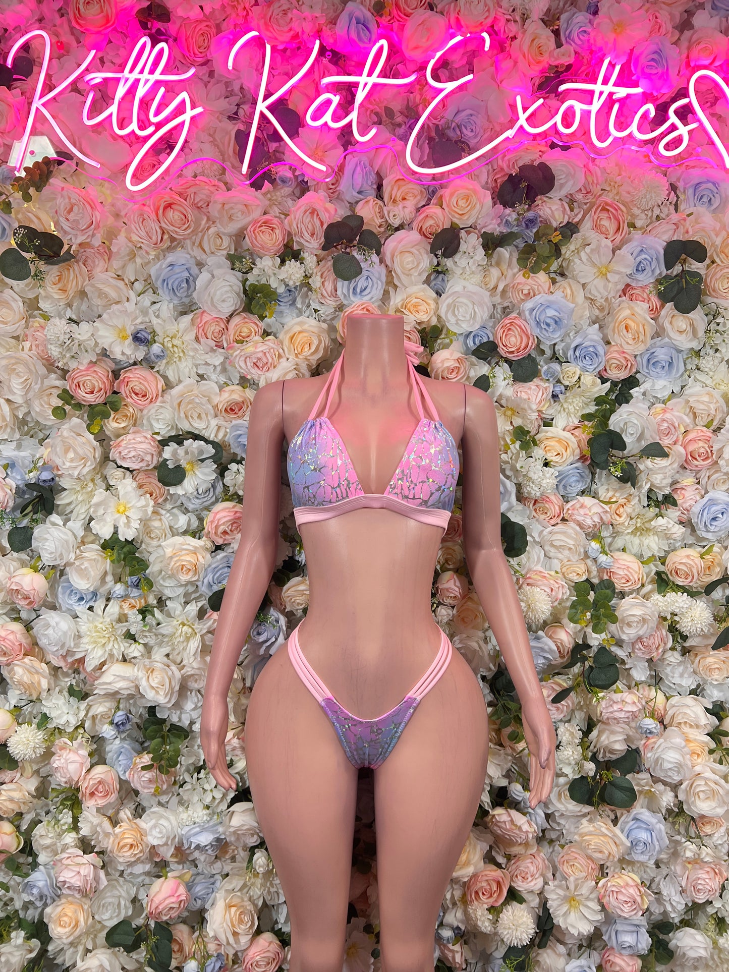 Pink-purple holographic triangle halter bikini with micro thong, front
