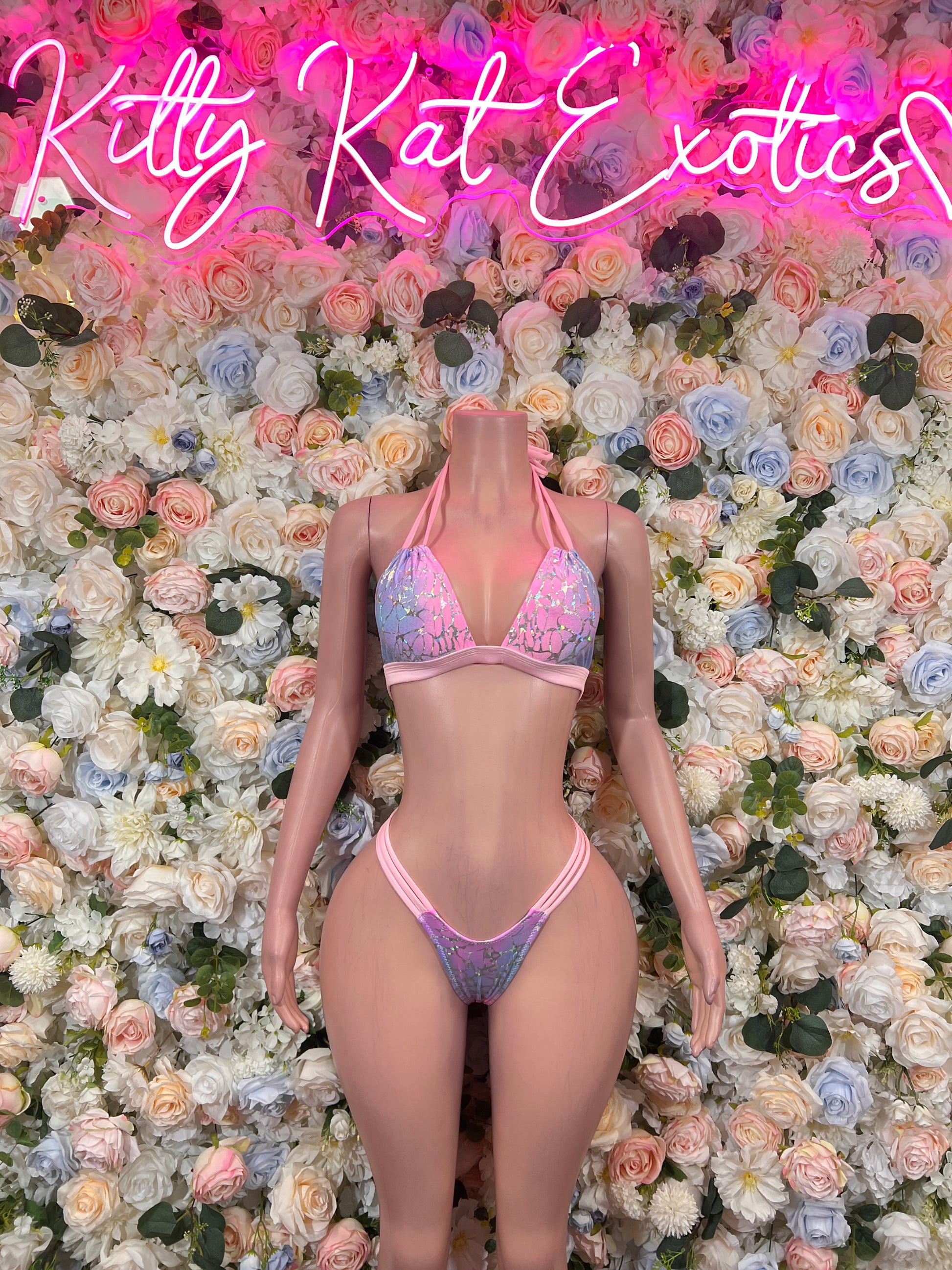 Pink-purple holographic triangle halter bikini with micro thong, front