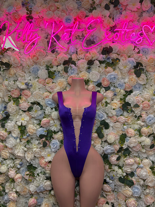 Purple one-piece bodysuit with deep V neckline and high-cut legs