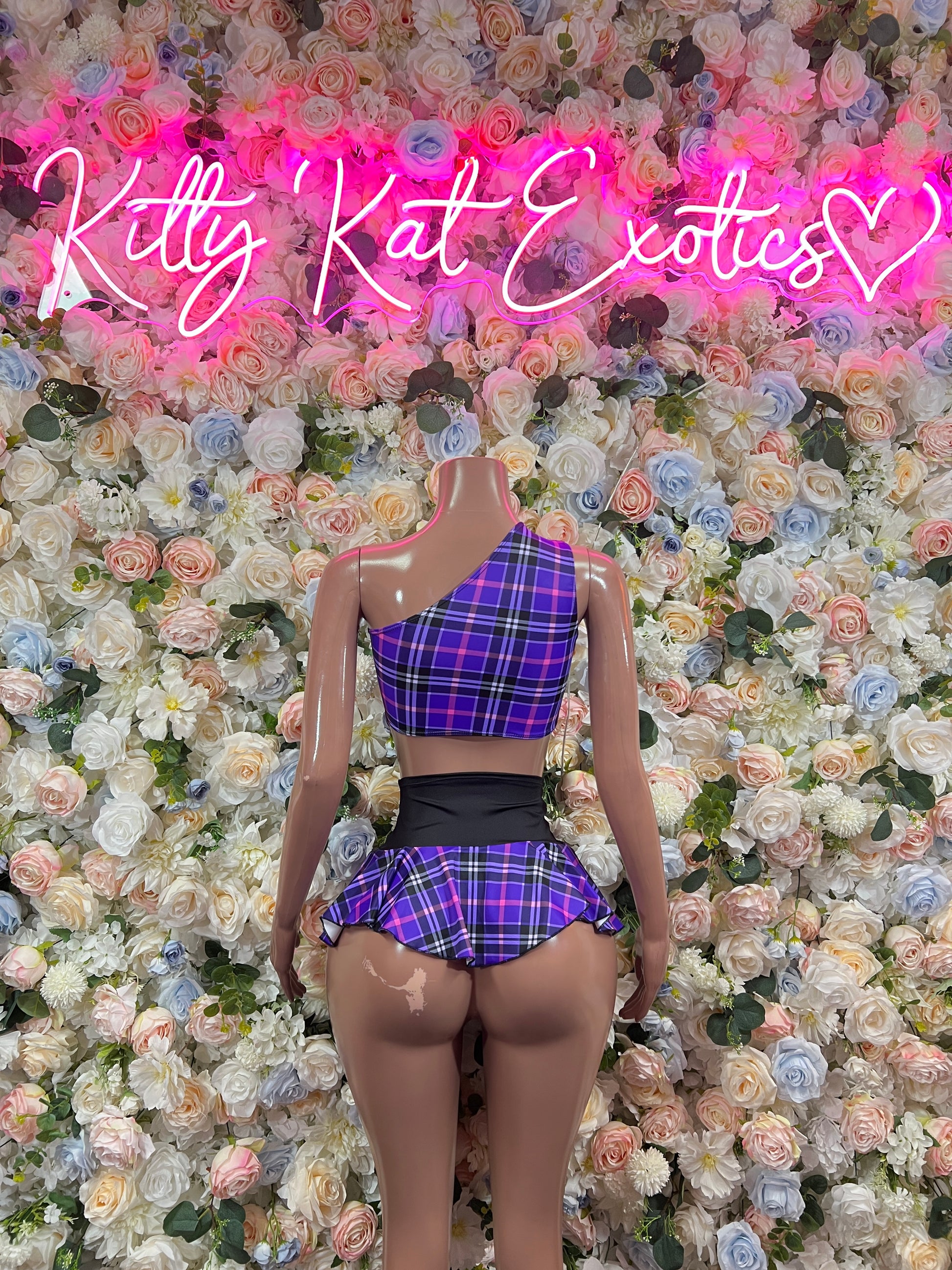 Purple plaid two-piece skirt set with cropped back top and ruffle mini skirt
