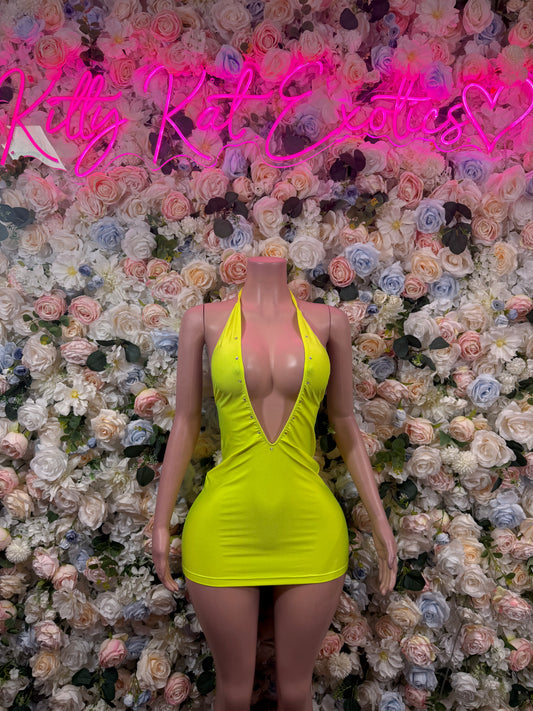 Neon yellow sleeveless mini dress with deep V neckline