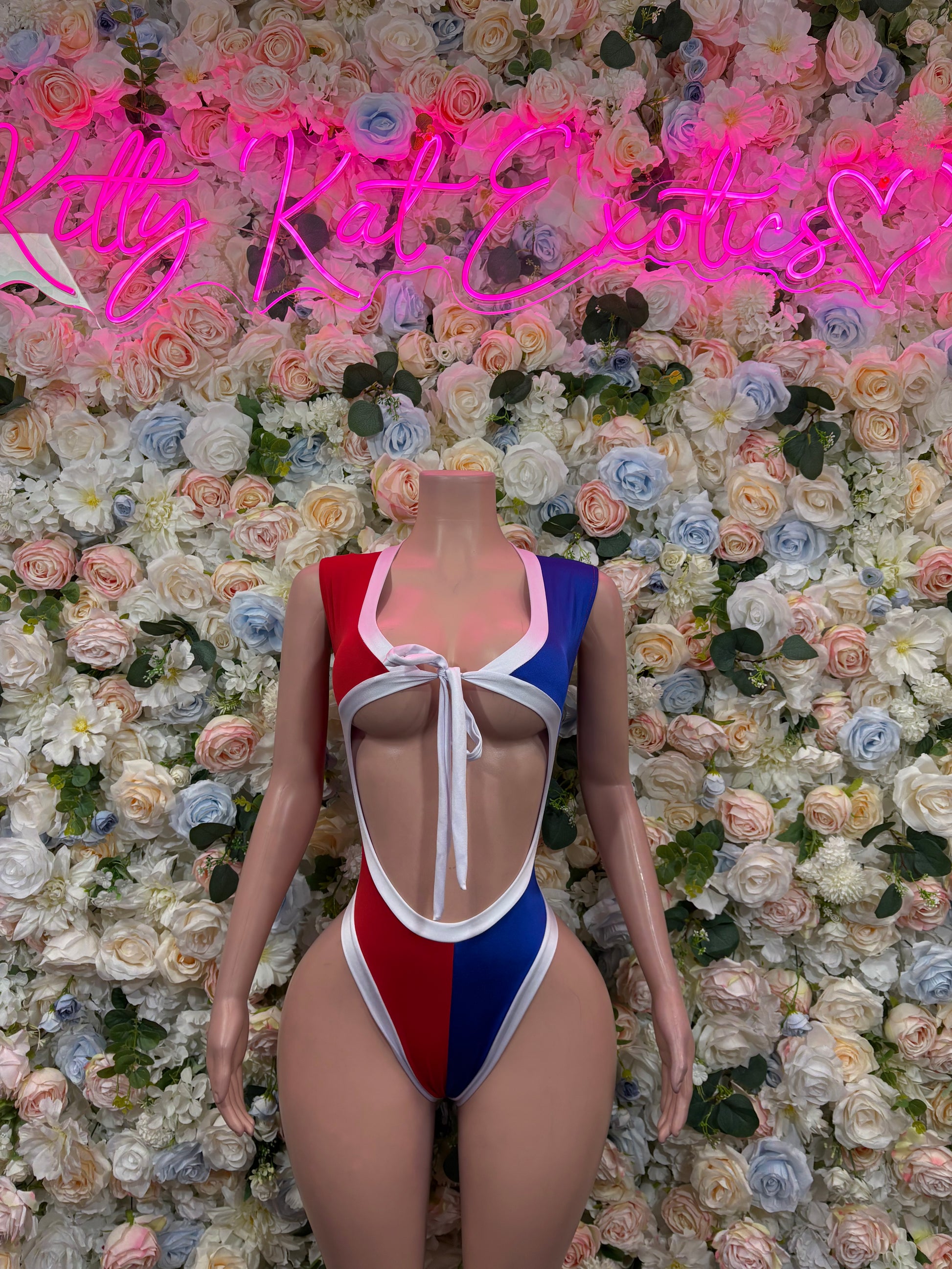 Dominican flag style bodysuit with lace-up front, high-cut one-piece in red, blue, white