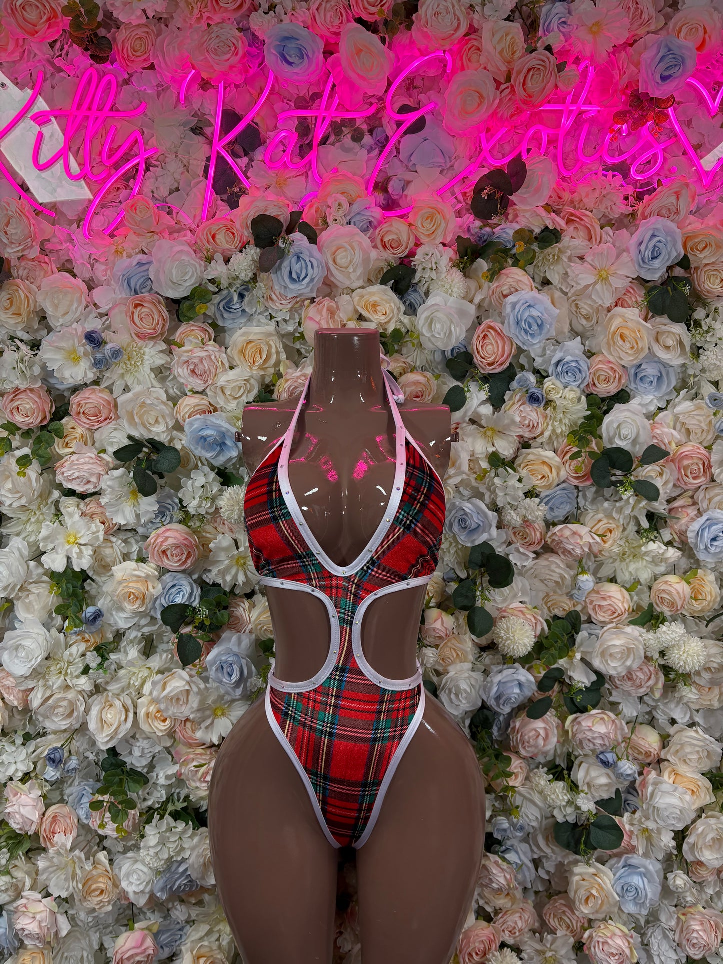 Red plaid cutout one-piece bodysuit with white trim and halter neckline