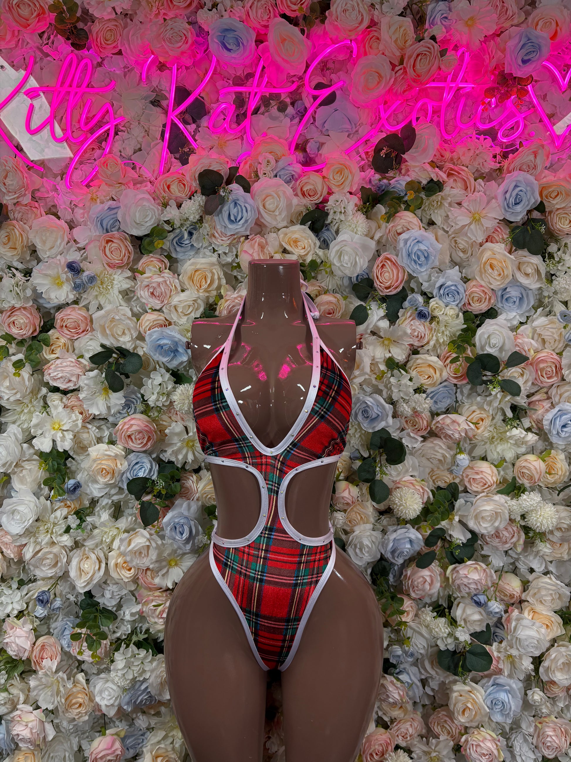 Red plaid cutout one-piece bodysuit with white trim and halter neckline