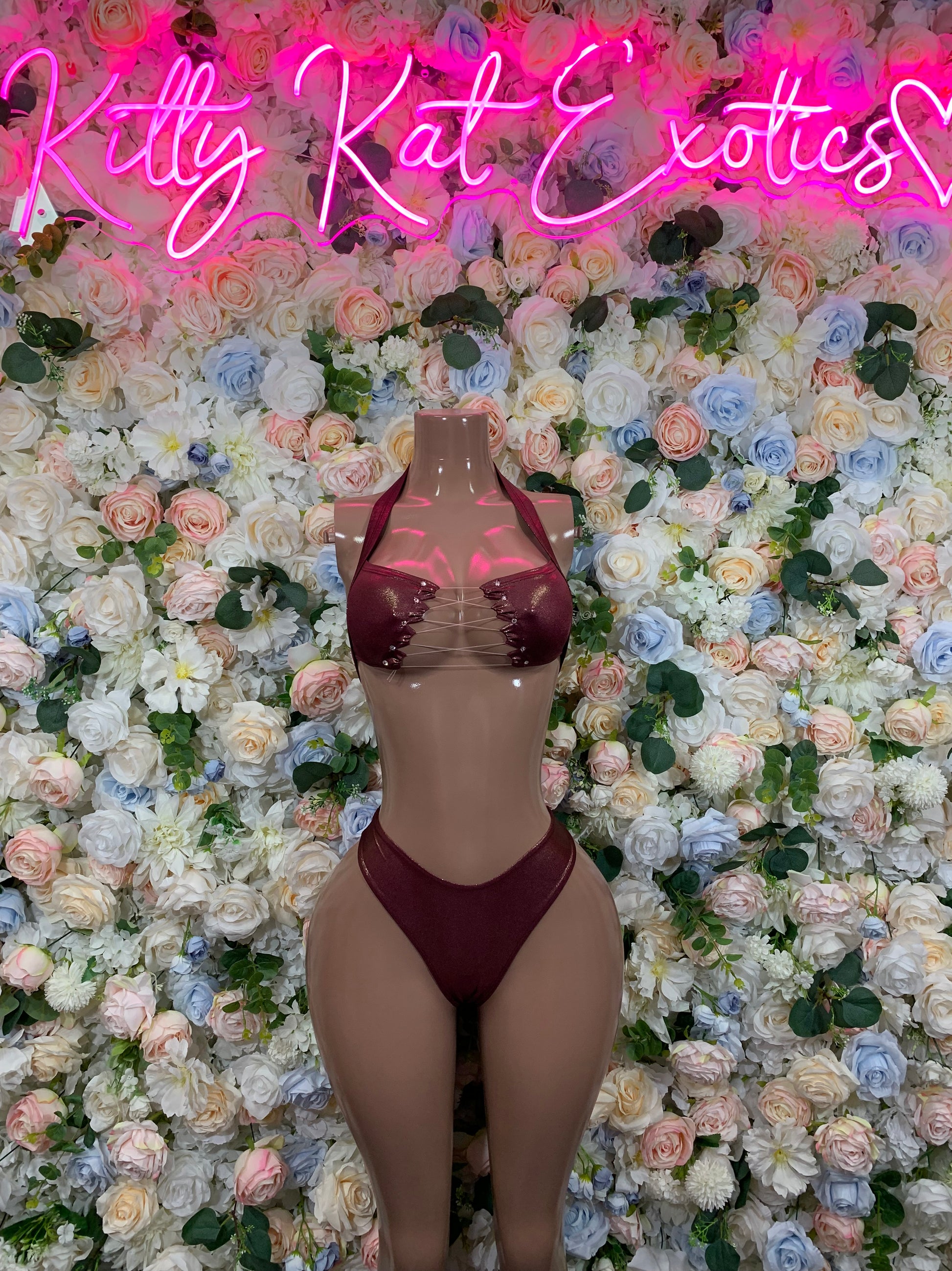 Burgundy metallic two-piece dancewear set with strappy bra top and thong bottoms, front view