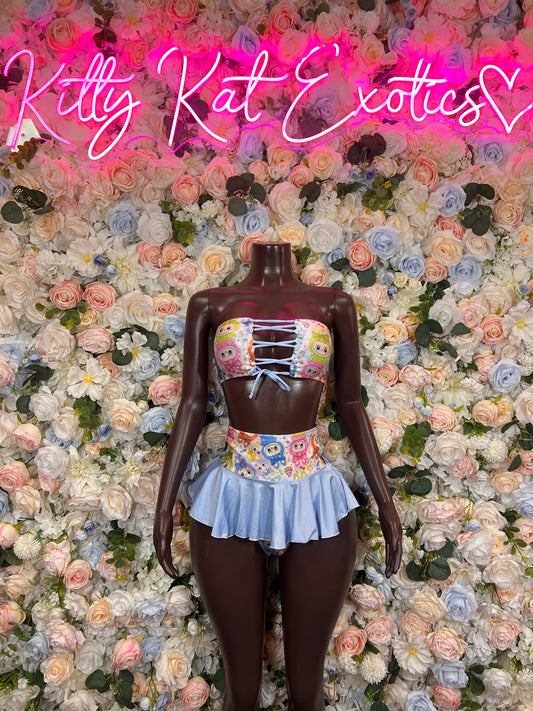 Two-piece festival skirt set with multicolor printed bandeau top and light blue ruffled skirt