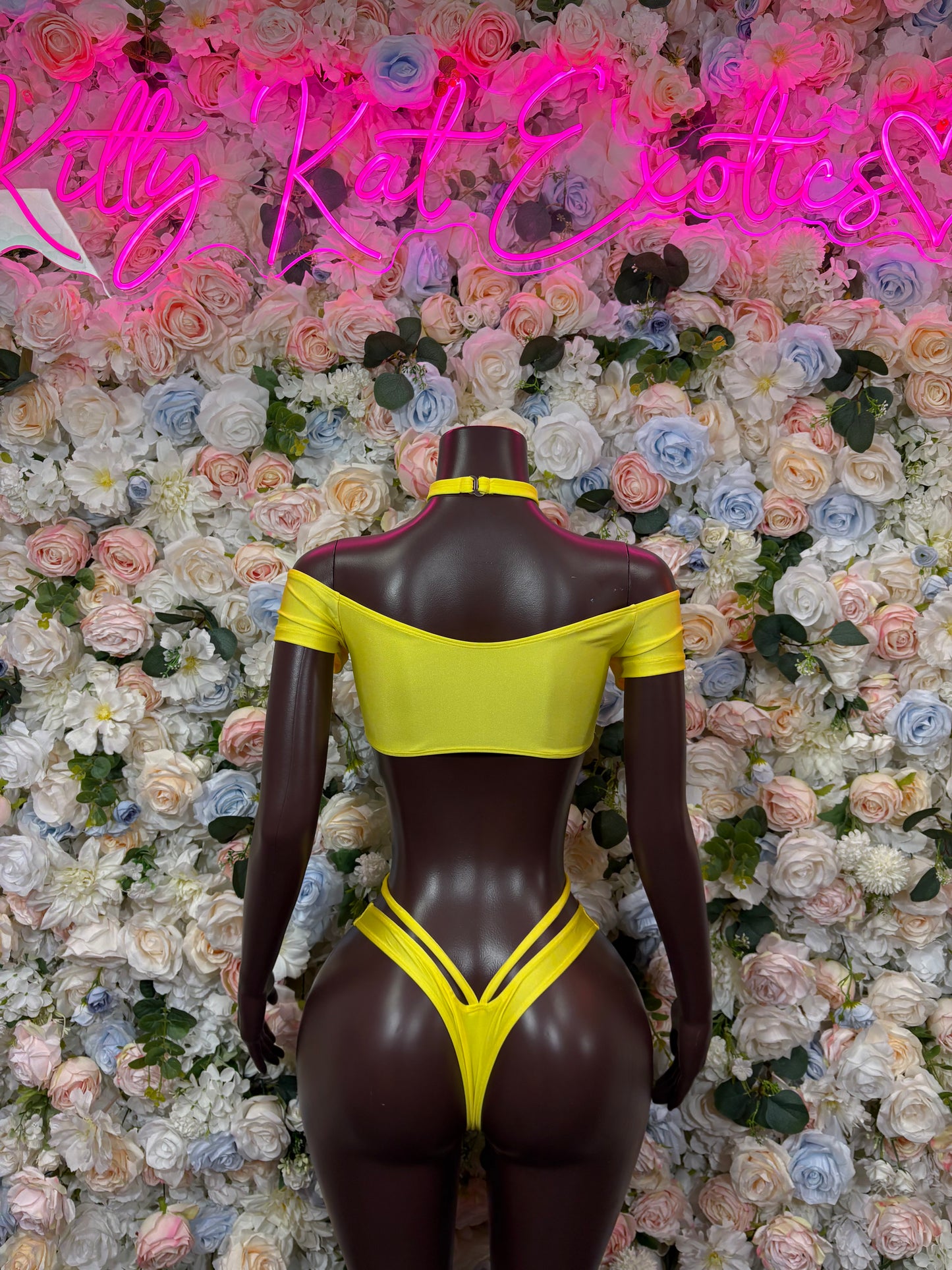 Bright yellow strappy two-piece dancewear set with triangle bra and high-cut bottoms