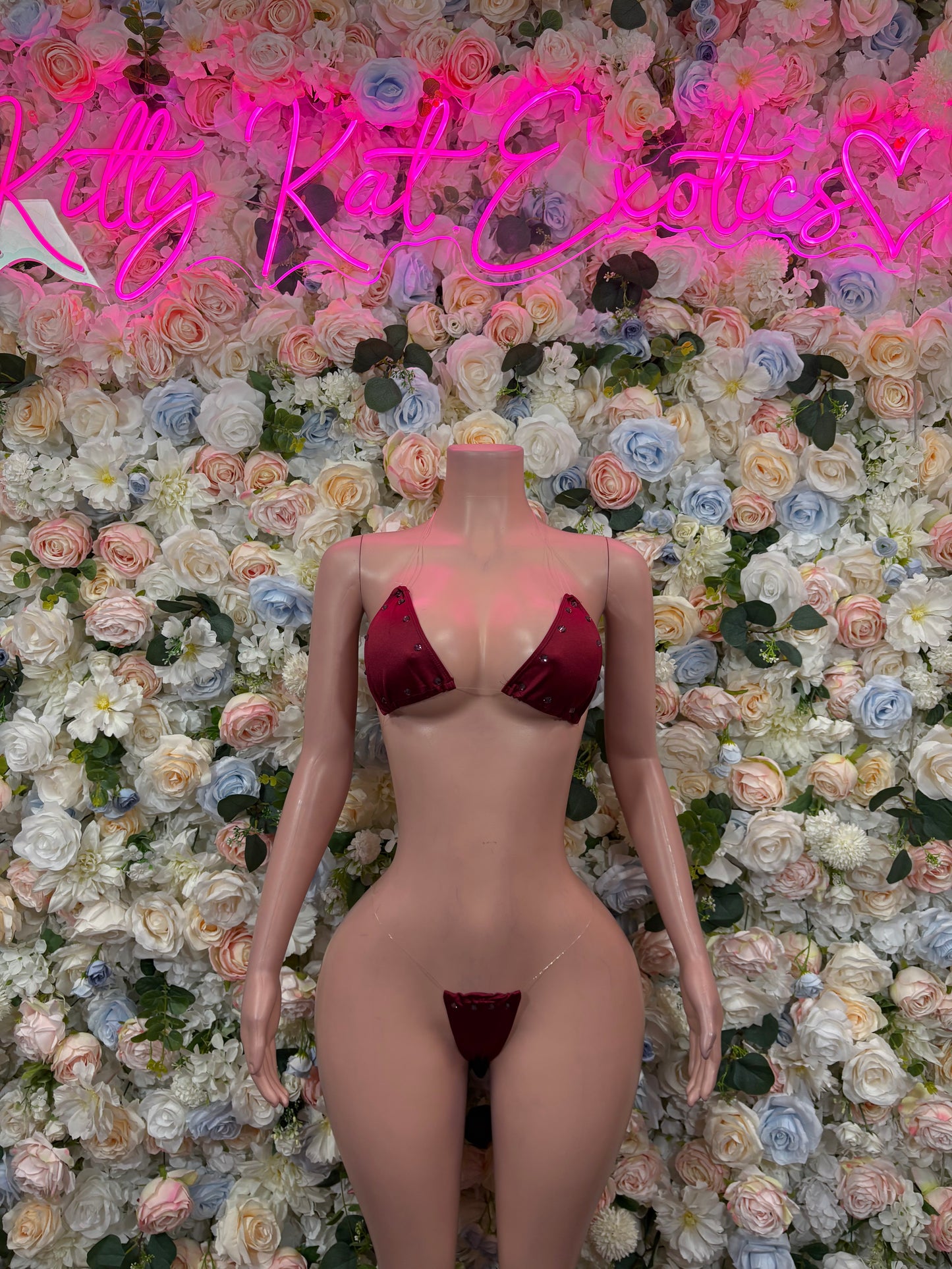 Red two-piece bikini with triangle bra and string g-string bottom