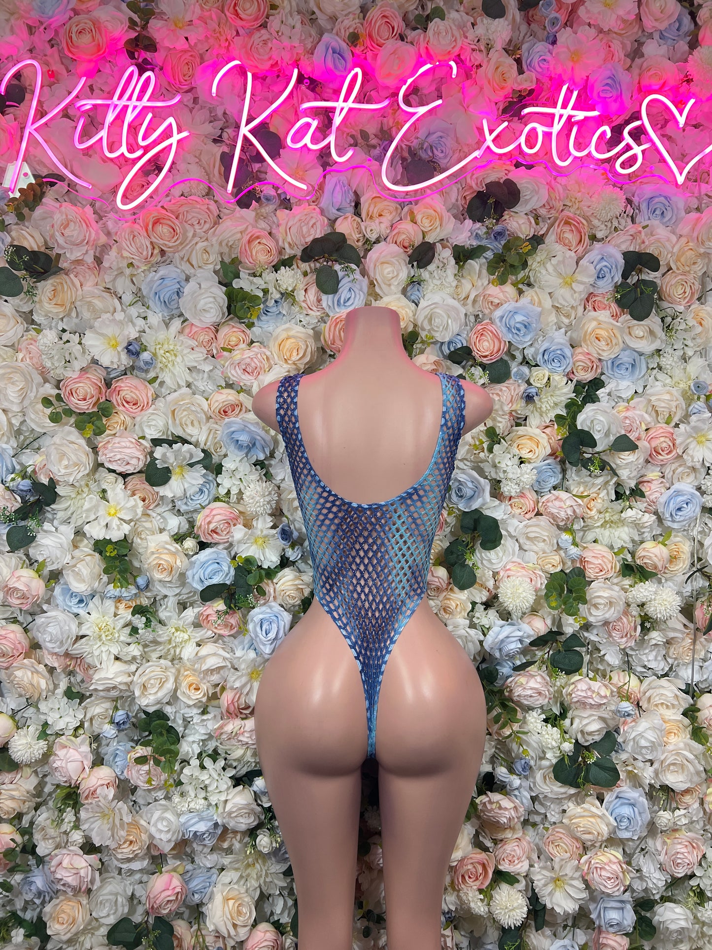 Blue fishnet bodysuit, open back with oval cutout and halter neckline