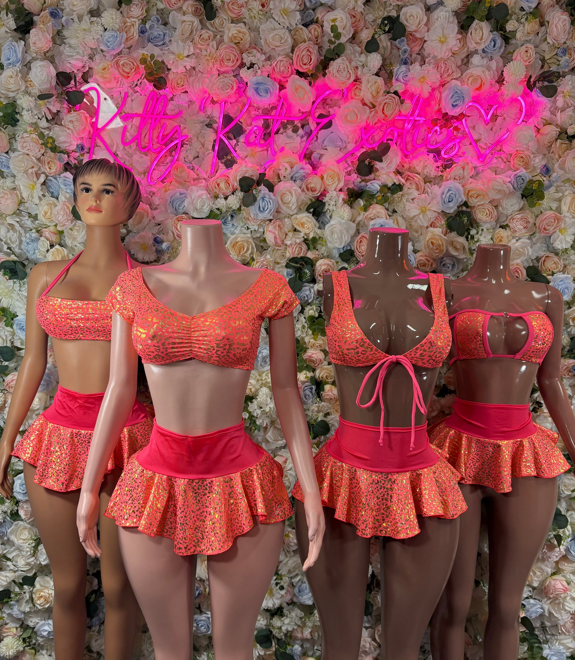 Coral glitter two-piece dance skirt set on multiple mannequins and model, ruffled hem