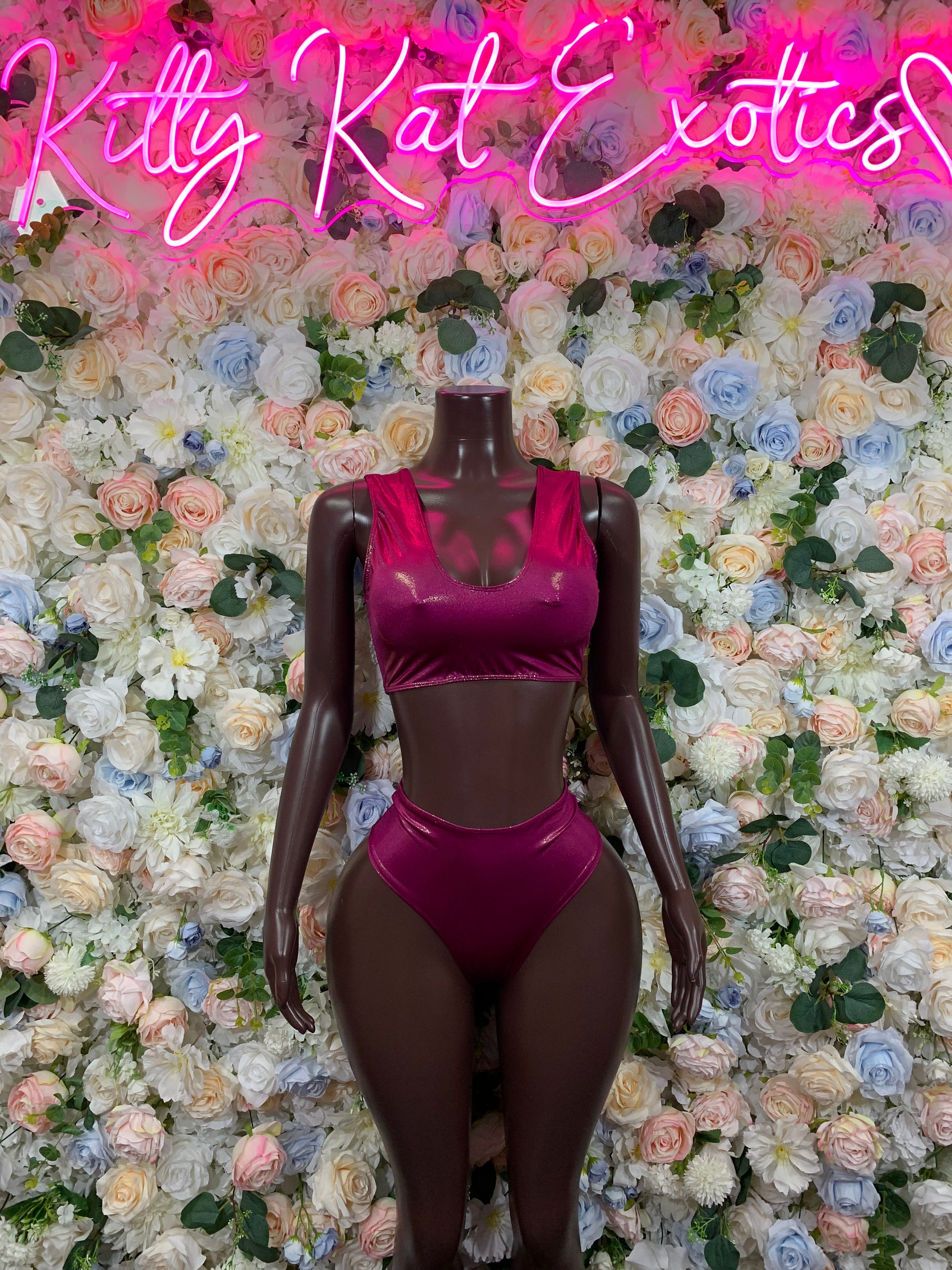 Burgundy metallic two-piece rave outfit with V-neck crop top and high-cut cheeky bottoms