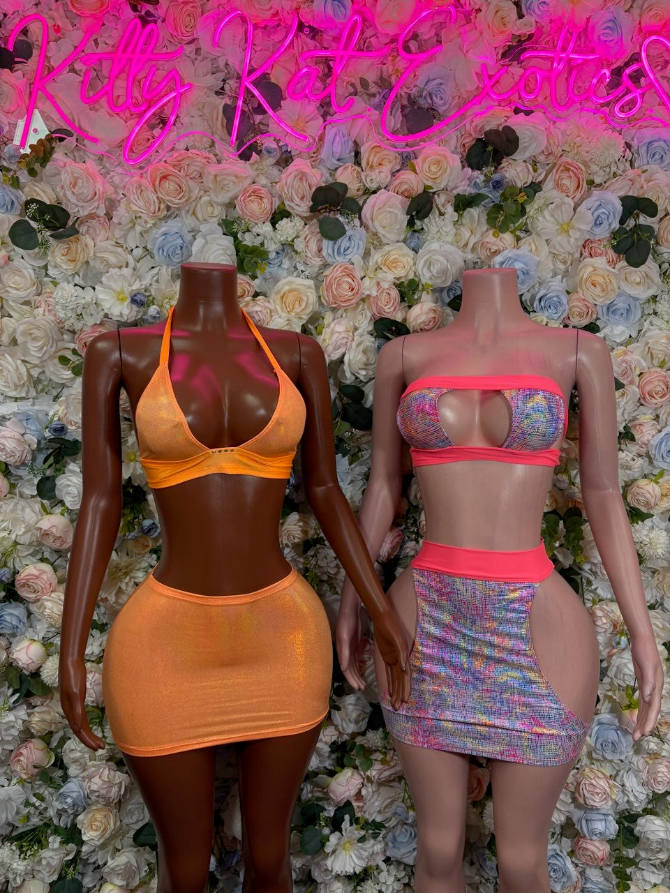 Two-piece rave set: orange bandeau crop top and mini skirt plus rainbow holographic set