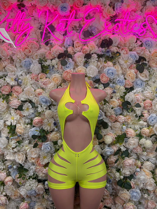 Neon green one-piece bodysuit with halter neckline, cutout chest, and backless legs