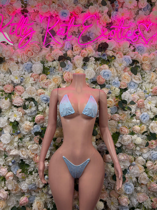 Baby blue bikini set with triangle top and matching bottoms, adjustable straps