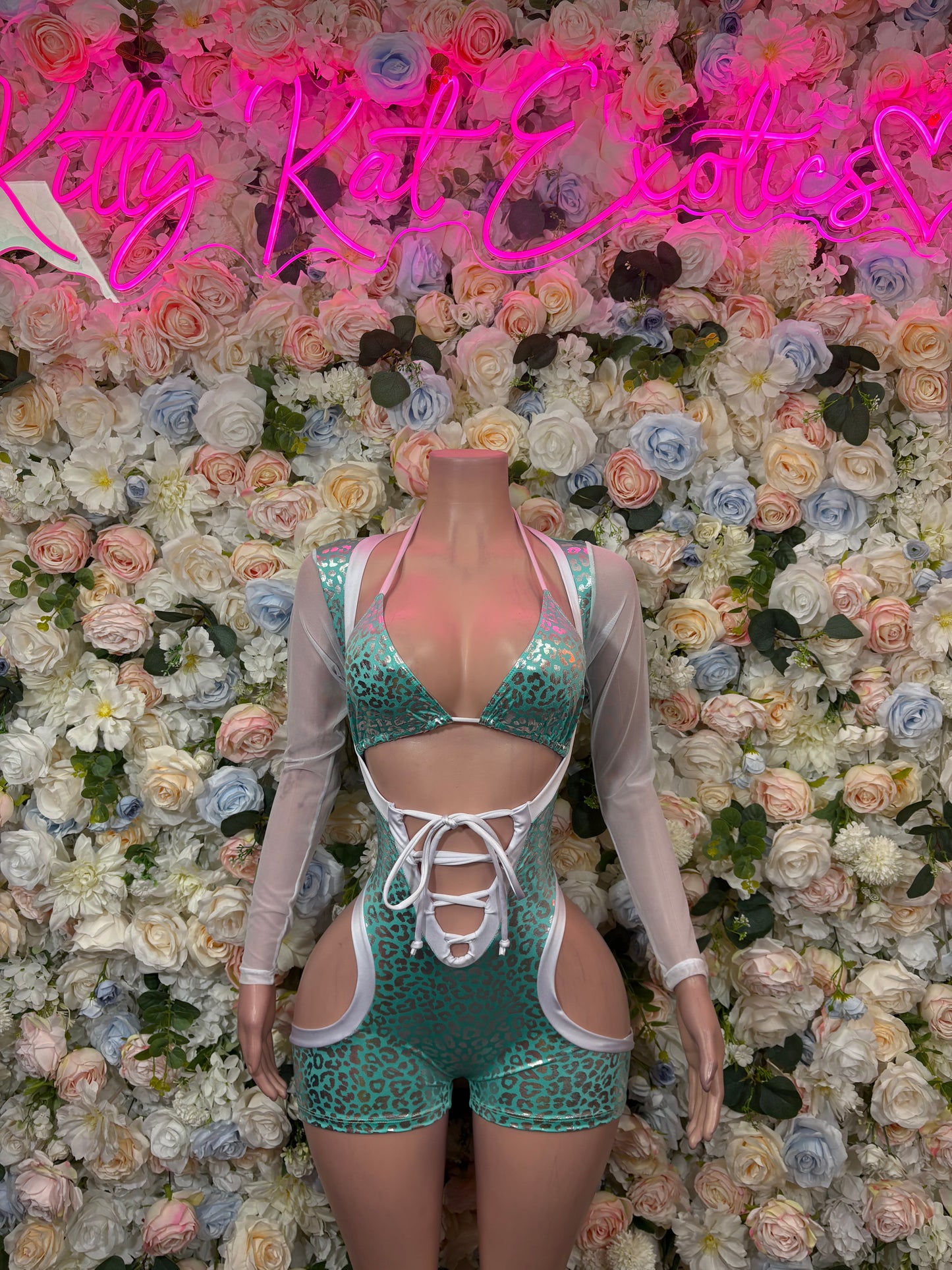 Turquoise cheetah print bodysuit with front lace-up and cutout, sheer sleeves