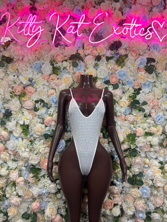 White rhinestone V-neck bodysuit on mannequin, high-cut one-piece with thin straps