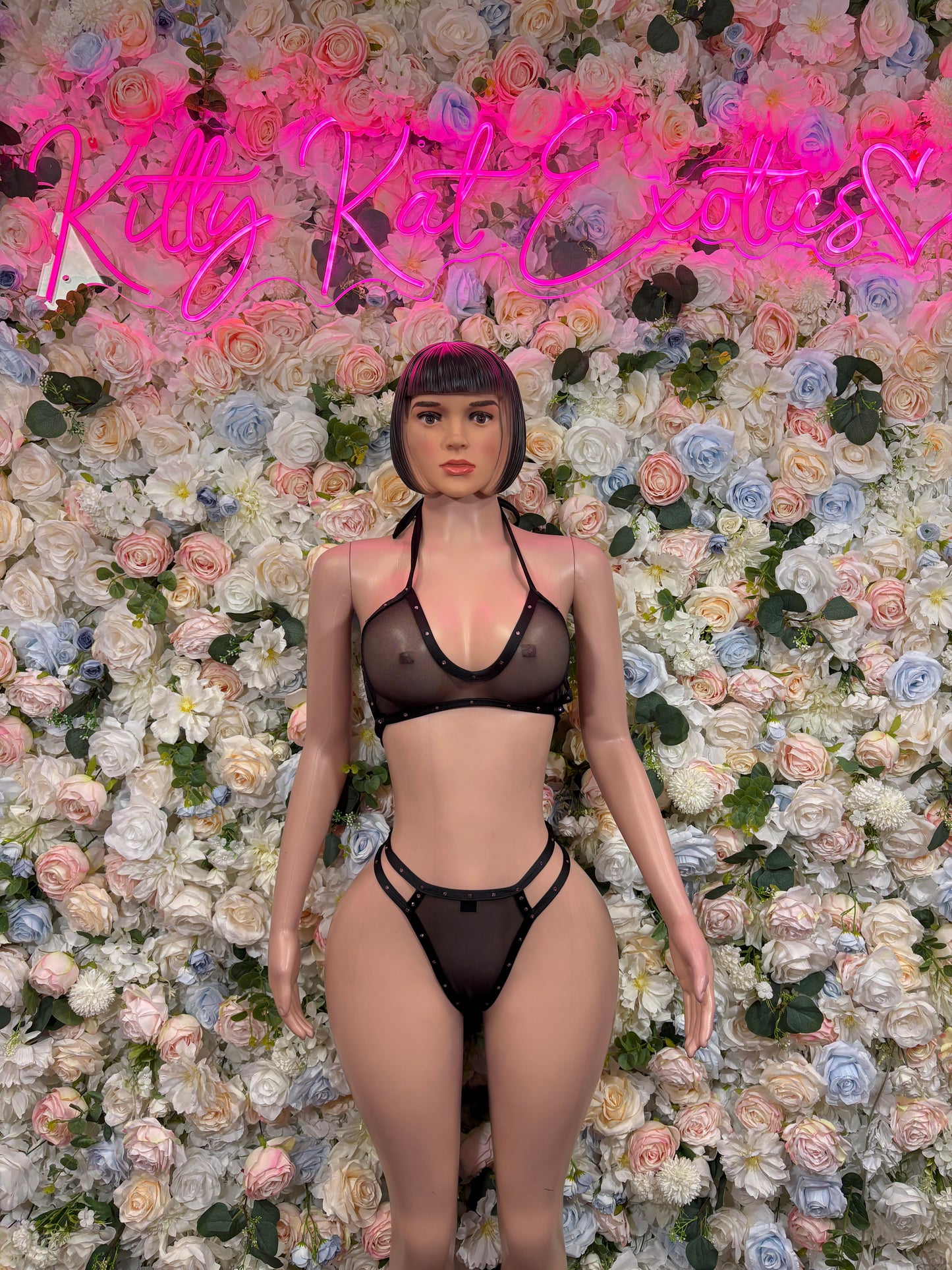 Black mesh bikini front view with triangle bra and high-cut strappy bottoms