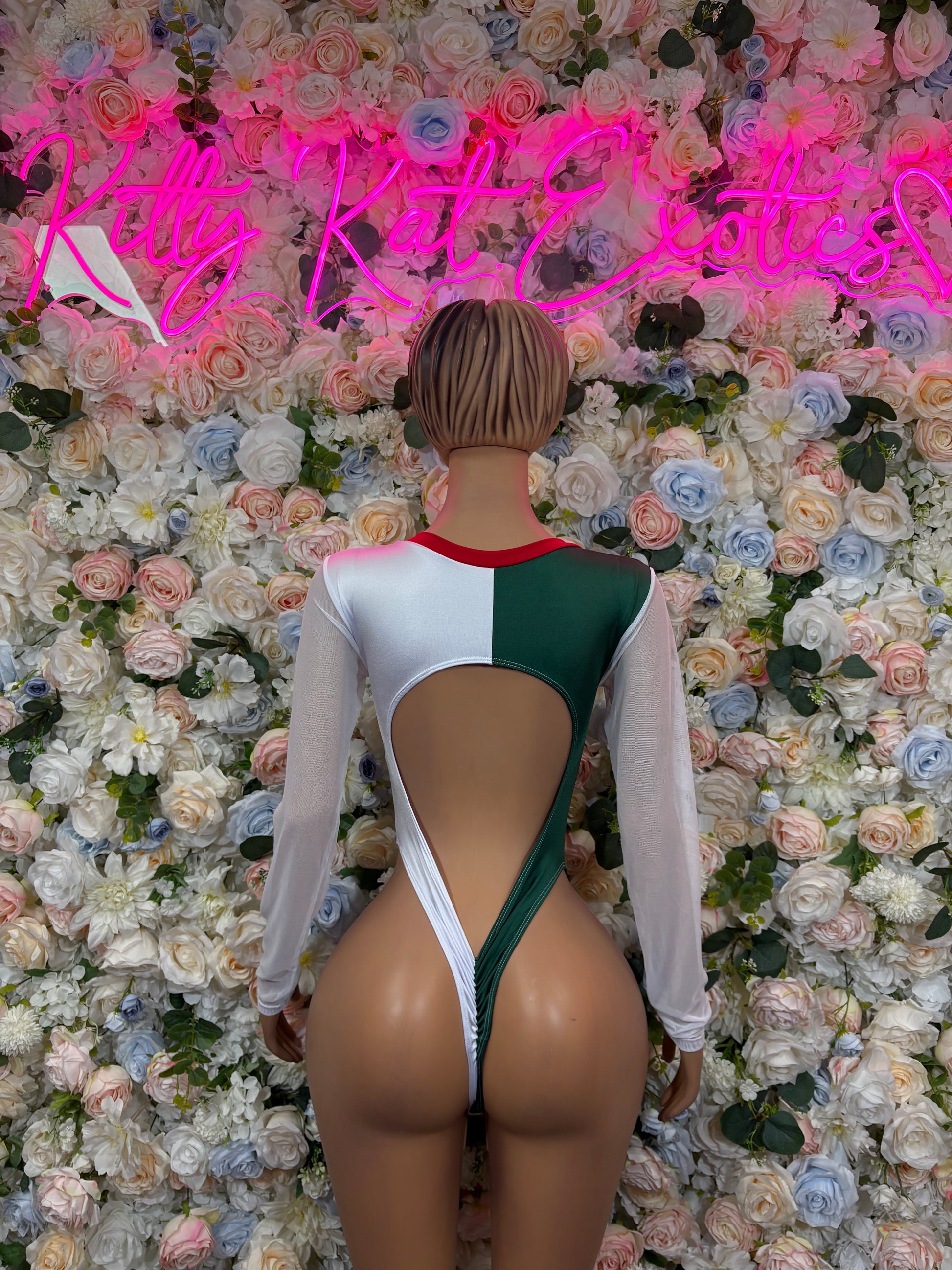 Women’s flag-style bodysuit with long sleeves, open back cutout, red tie neck