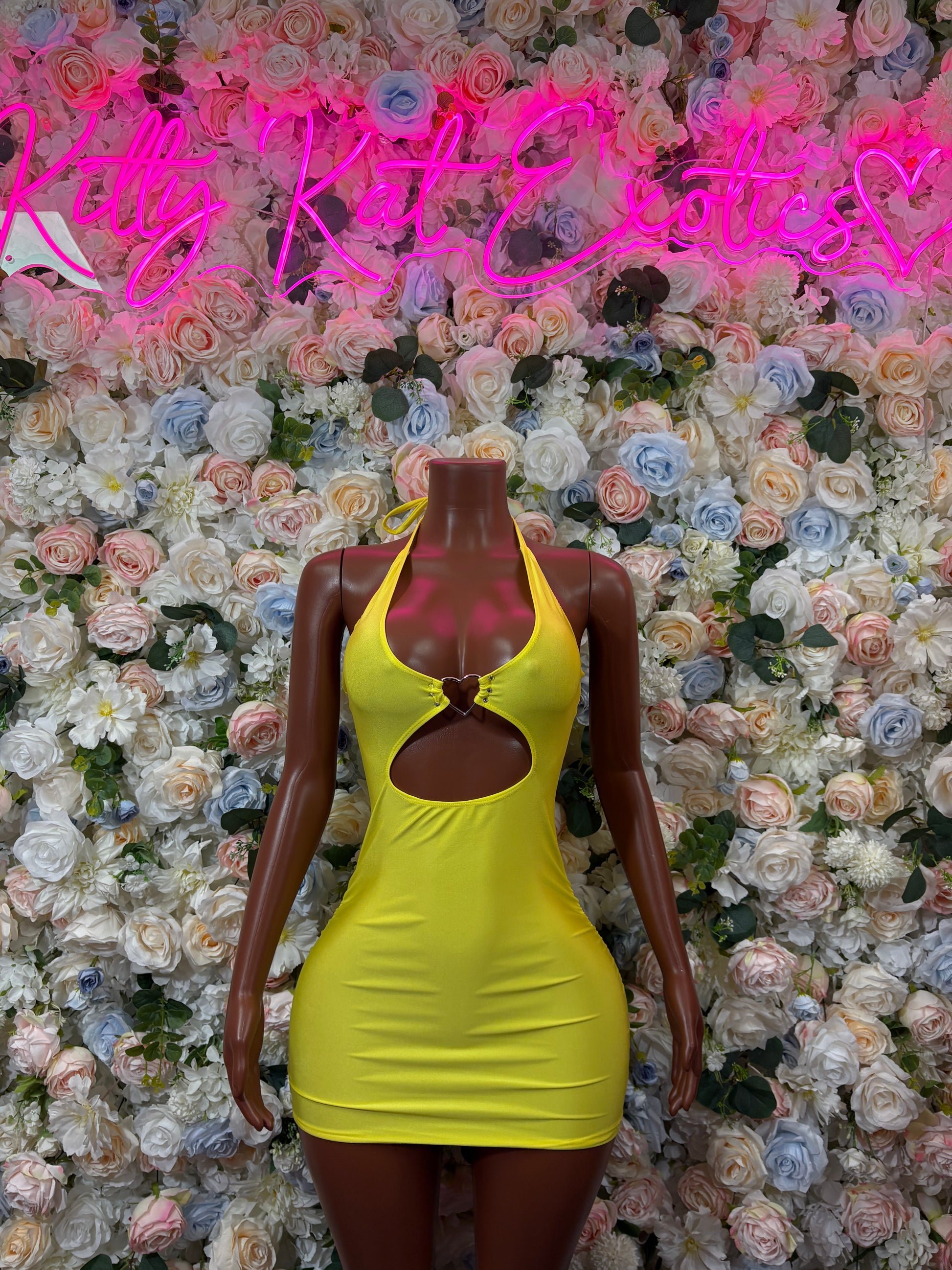 Yellow halter mini dress with cutout chest and backless neckline